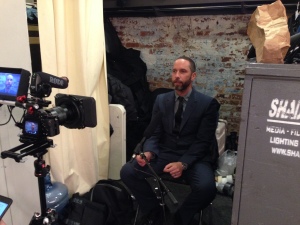 Alexis Bittar behind the scenes talking Lucite® ... moments before the NYFW event began.