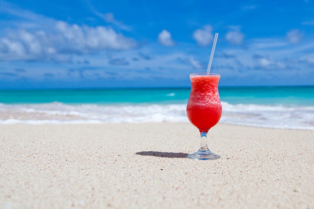 fruity drink on the beach - free summer stock photos