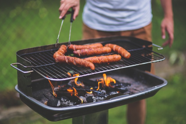grilling BBQ hot dogs - free summer stock photo