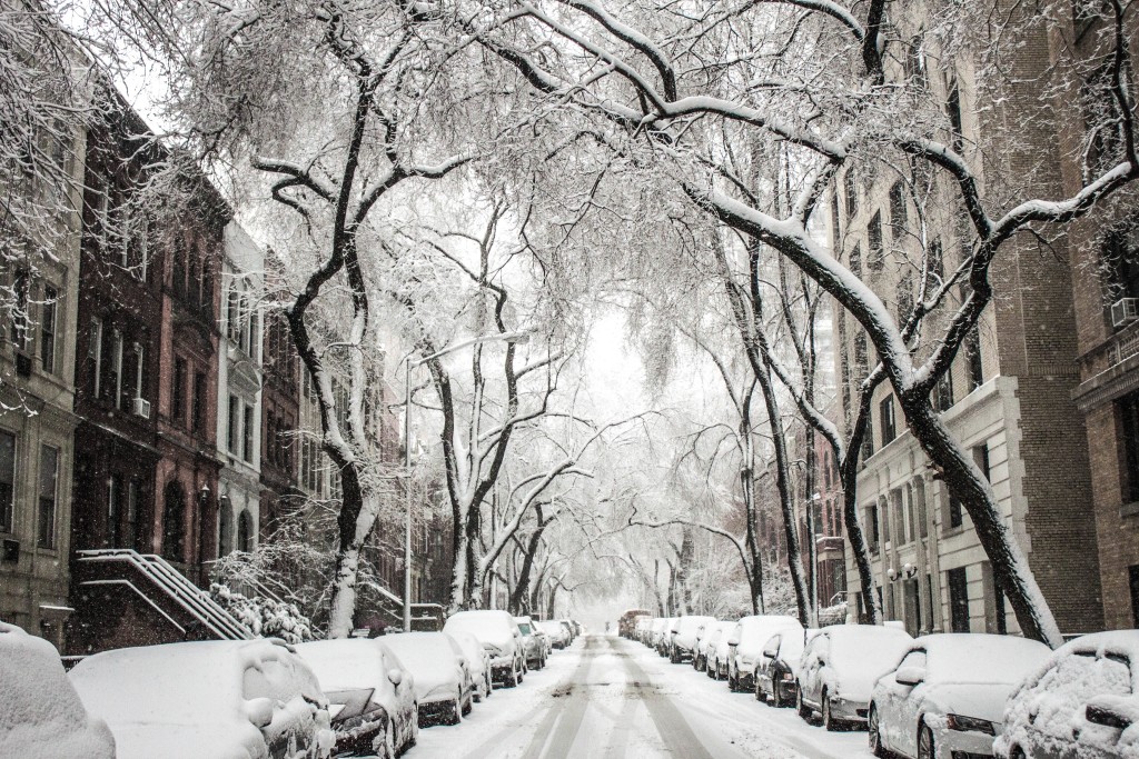 Snow on city street and cars - free winter stock photo